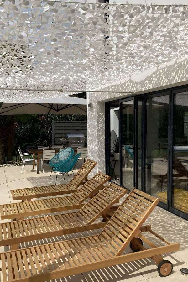 Filet d'ombrage camouflage renforcé sur terrasse